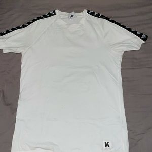 Like brand new vintage kappa t shirt with signs on the sleeves